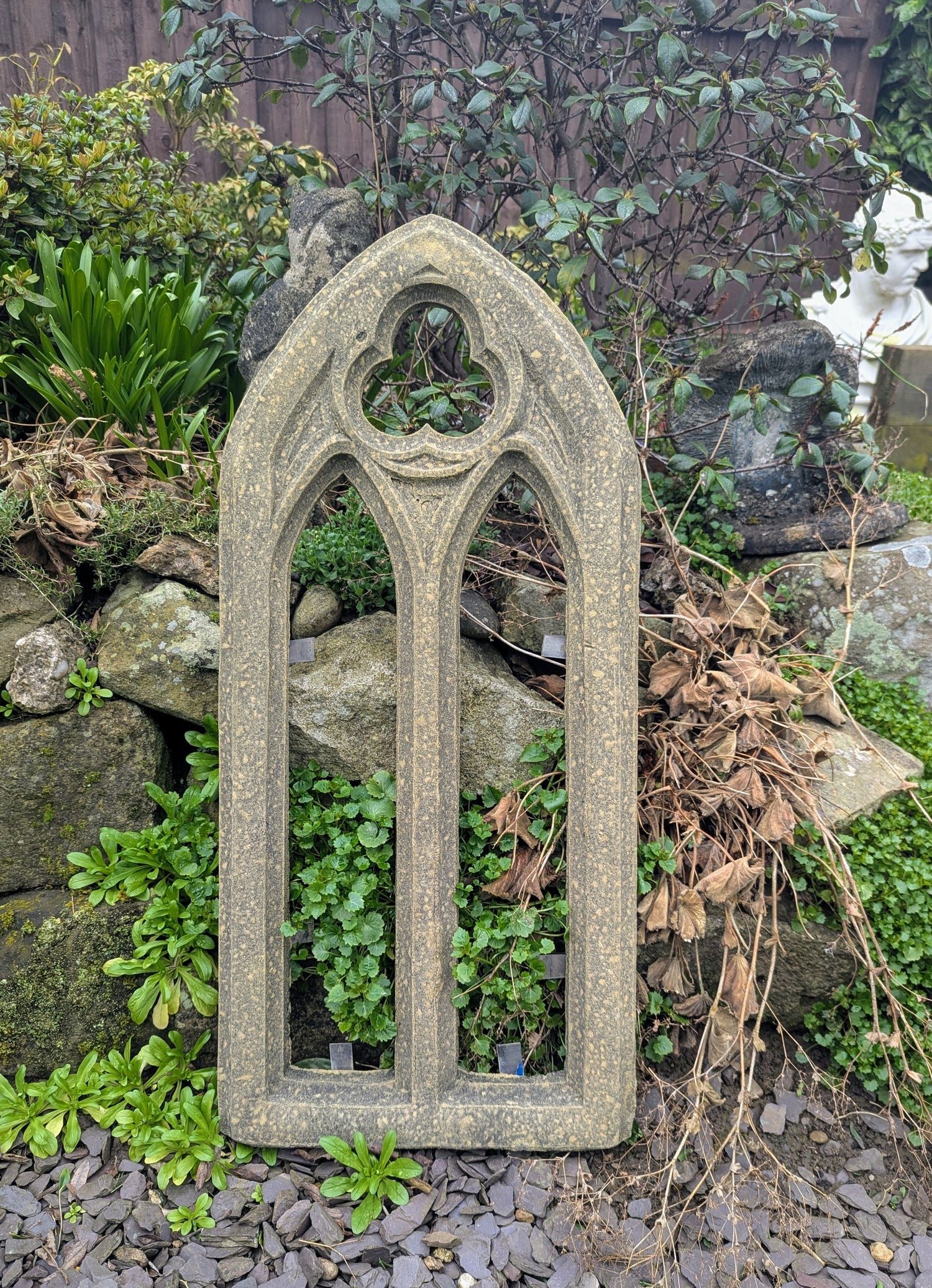 Garden stone statues - church window staturary