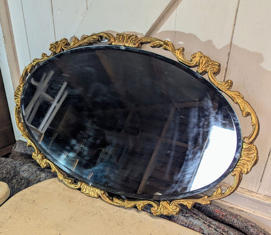 Rococo style gilt framed beveled edge wall mirror