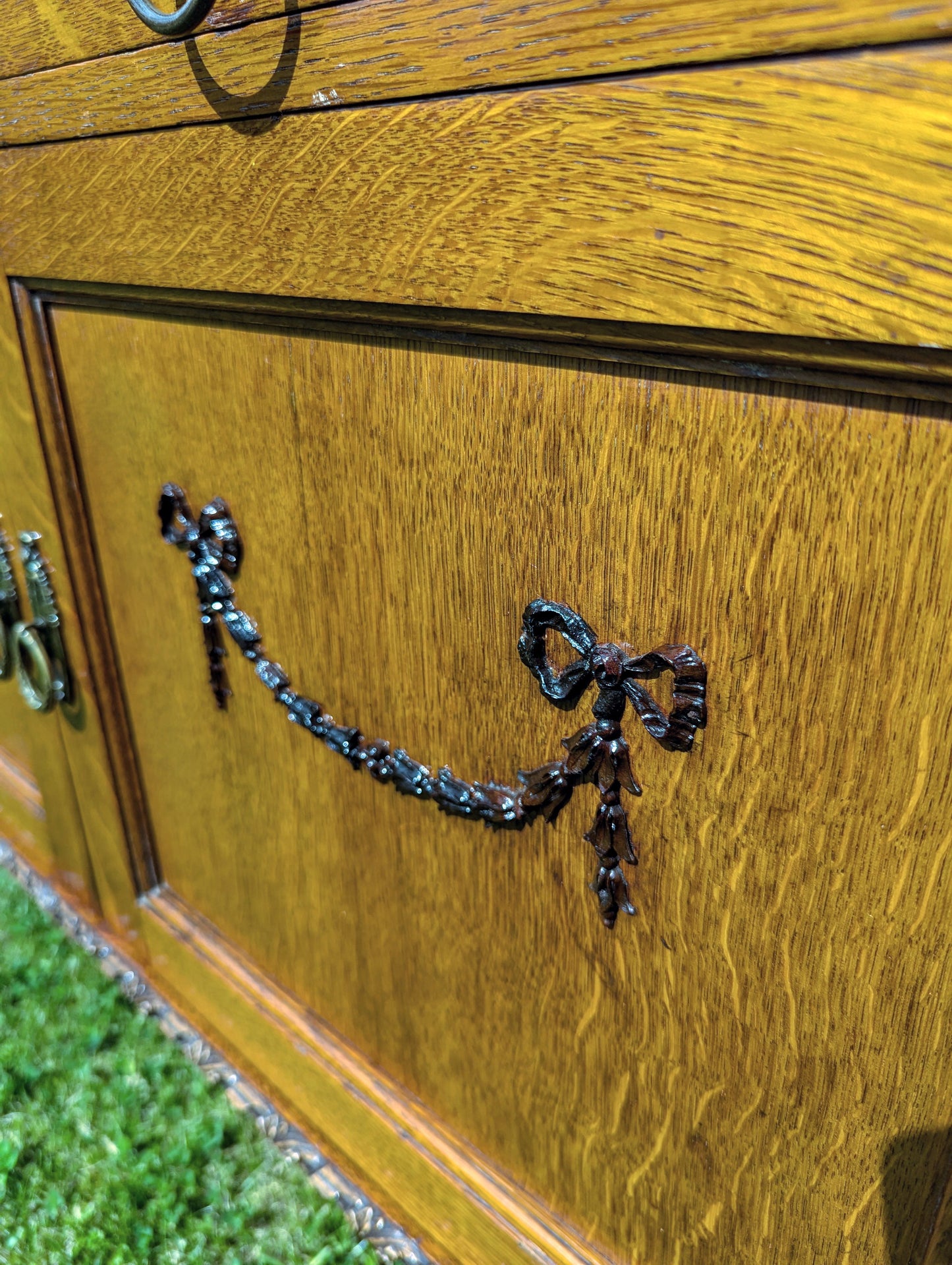 Antique early 20th century ball and claw feet bureau including secret compartment