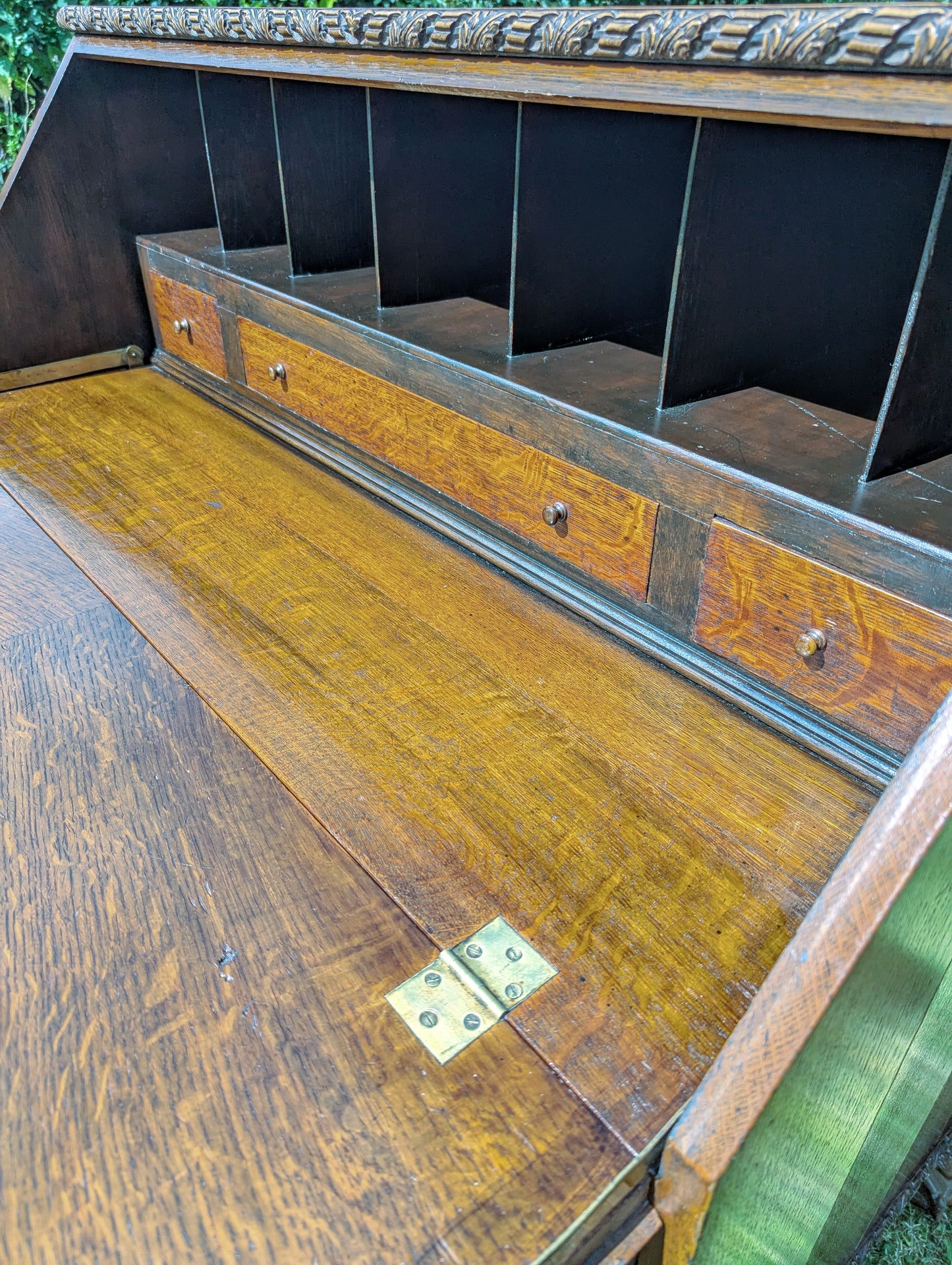 Antique early 20th century ball and claw feet bureau including secret compartment