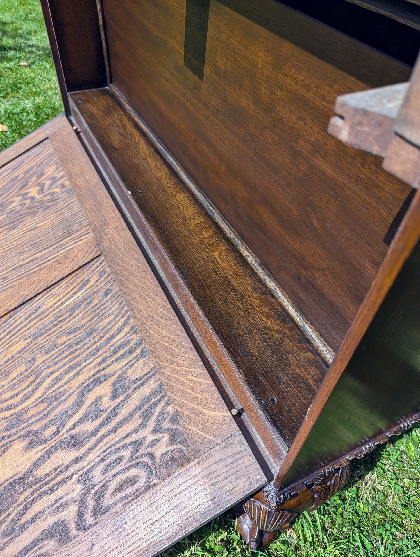 Antique early 20th century ball and claw feet bureau including secret compartment