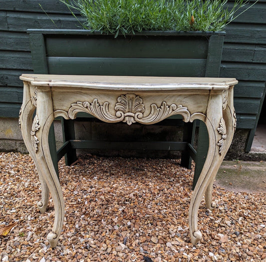 French carved demi line console table