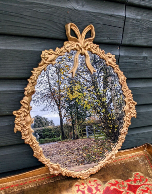 Gilded Vintage Mirror With Bow