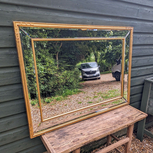 Contemporary style bevelled edge gilt frame mirror