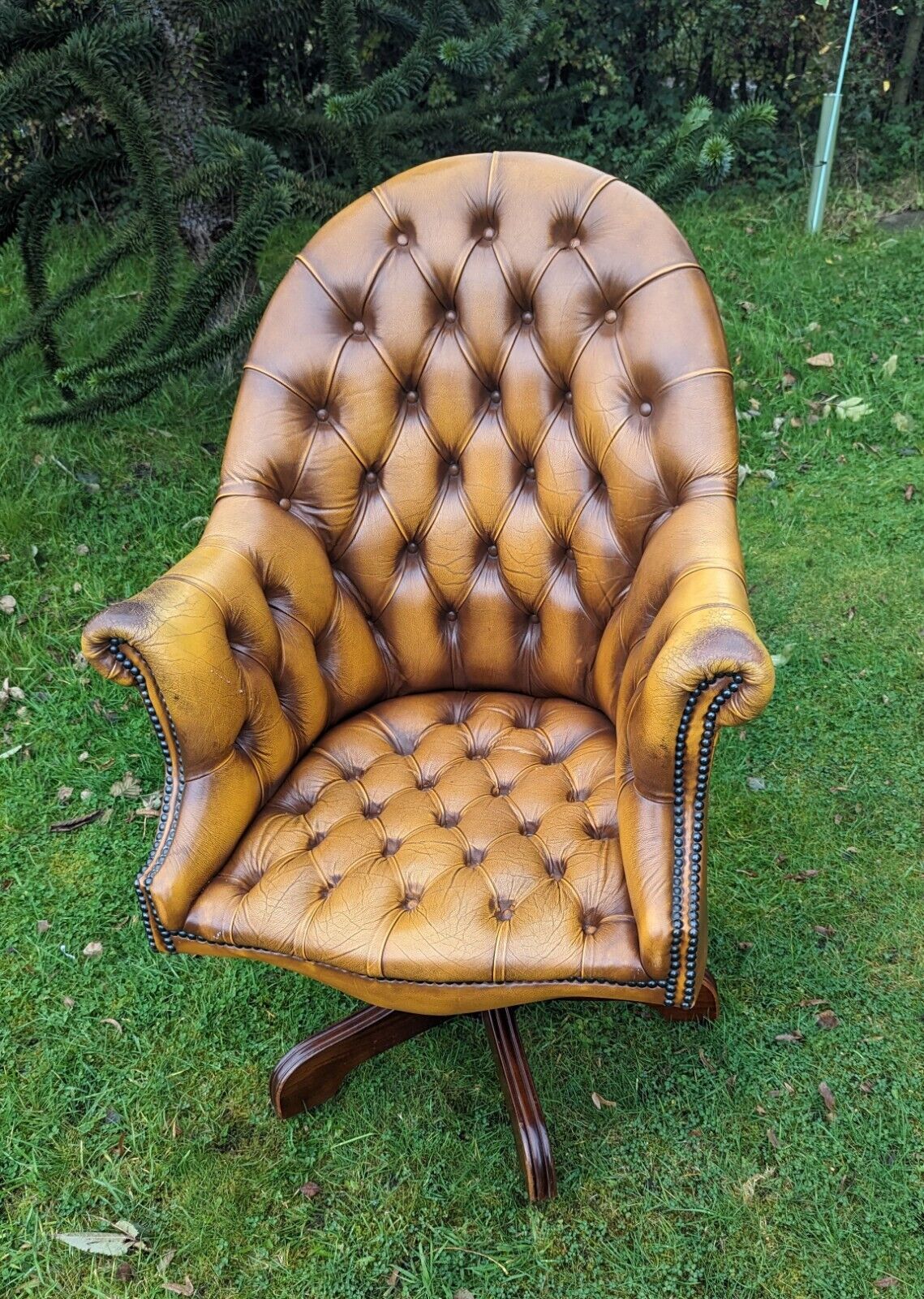 1950s Directors tan leather tilt chesterfield