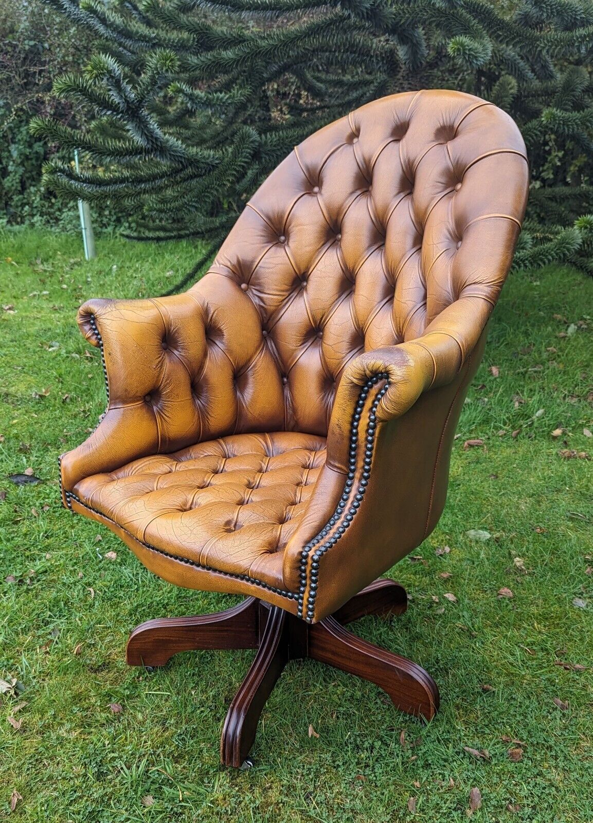 1950s Directors tan leather tilt chesterfield