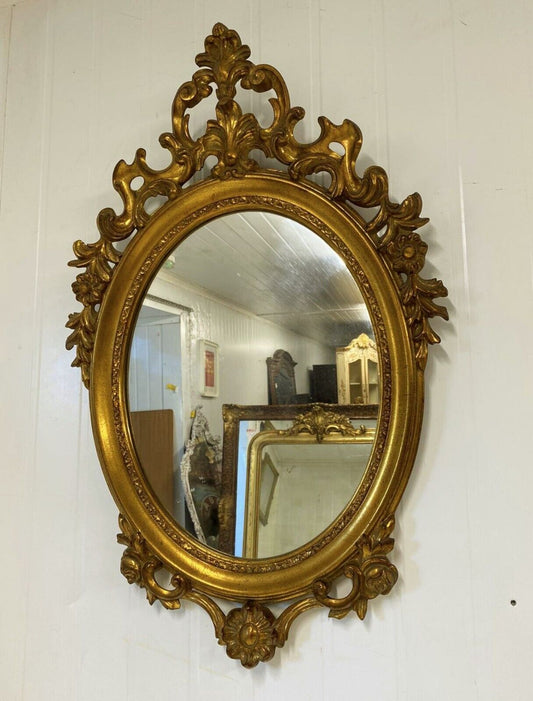 Deknudt of Belgium oval gilt mirror