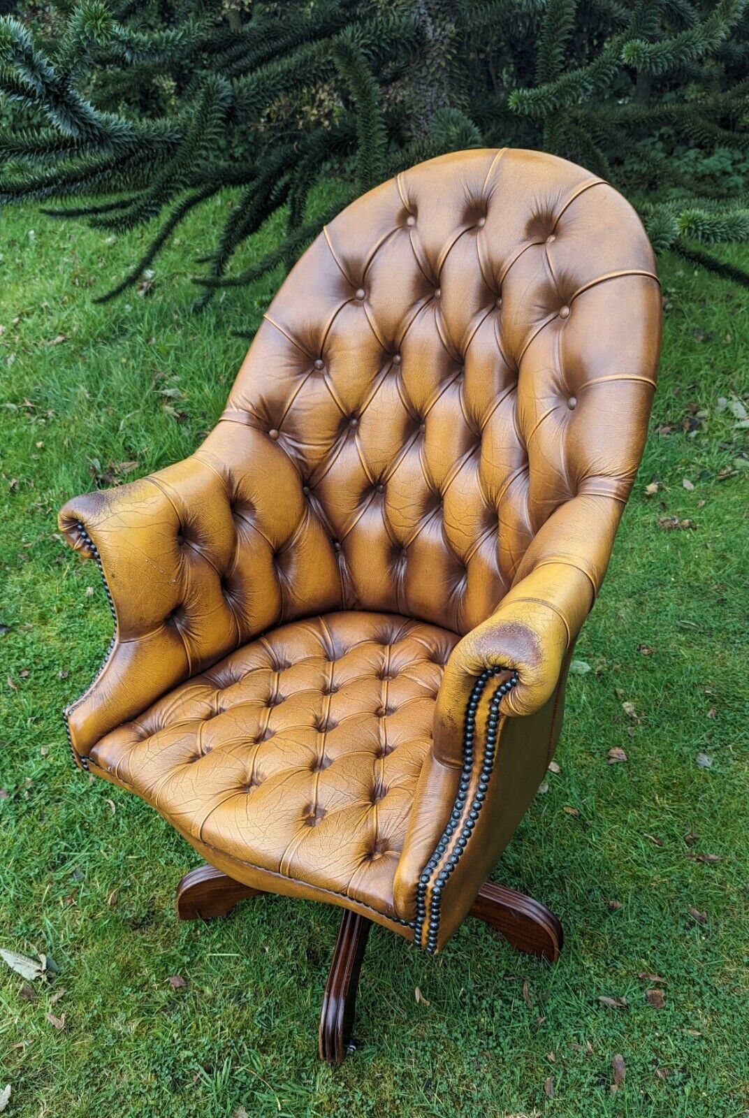 1950s Directors tan leather tilt chesterfield